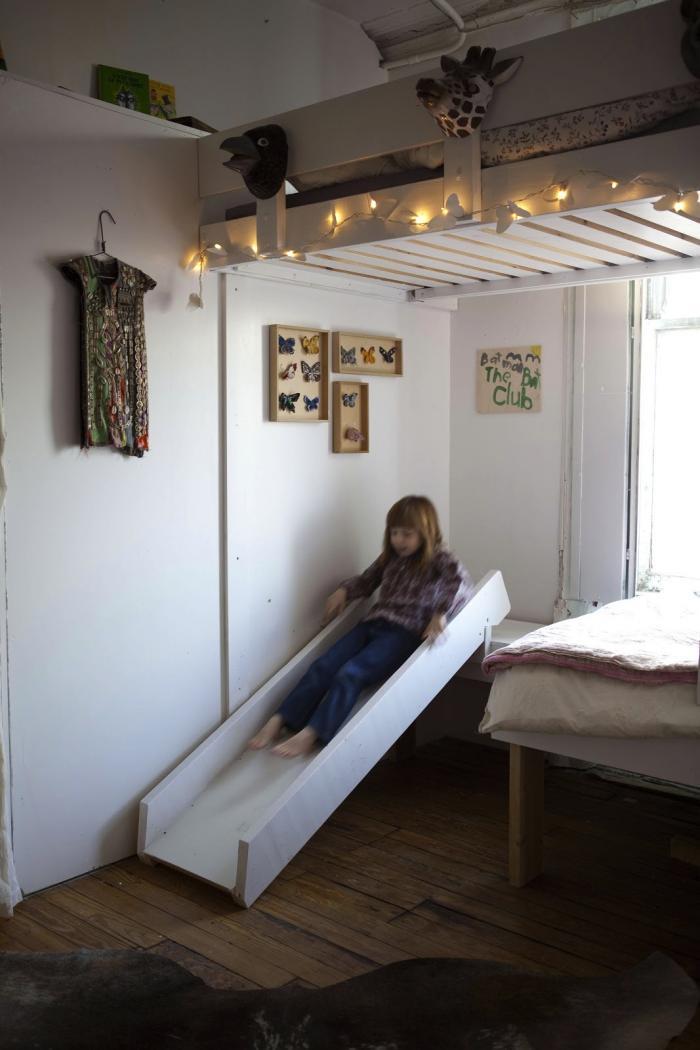 A wooden slide in a girls room