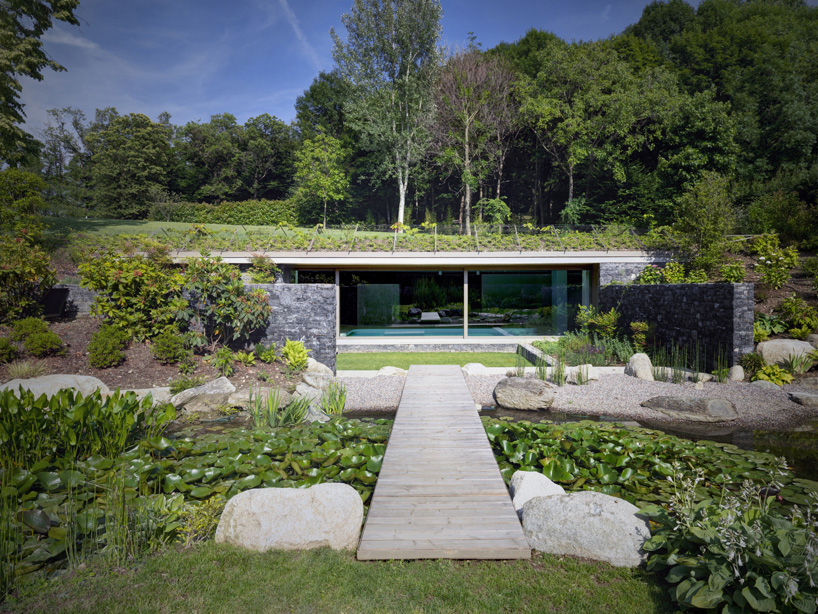 Act romegialli’s underground pavilion with swimming pool interior