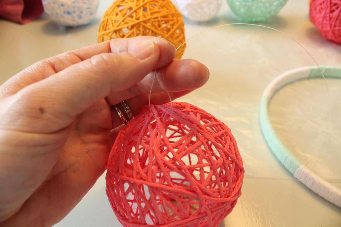 Attach string balls