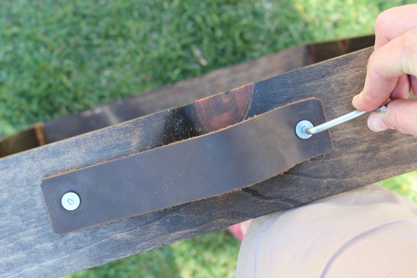 Attach the leather handles