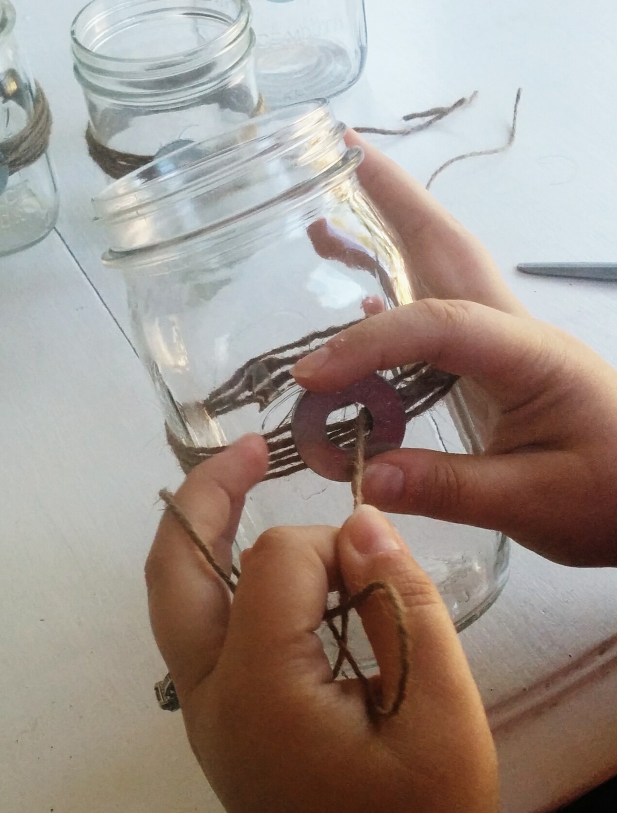 Attaching washer detail to jar