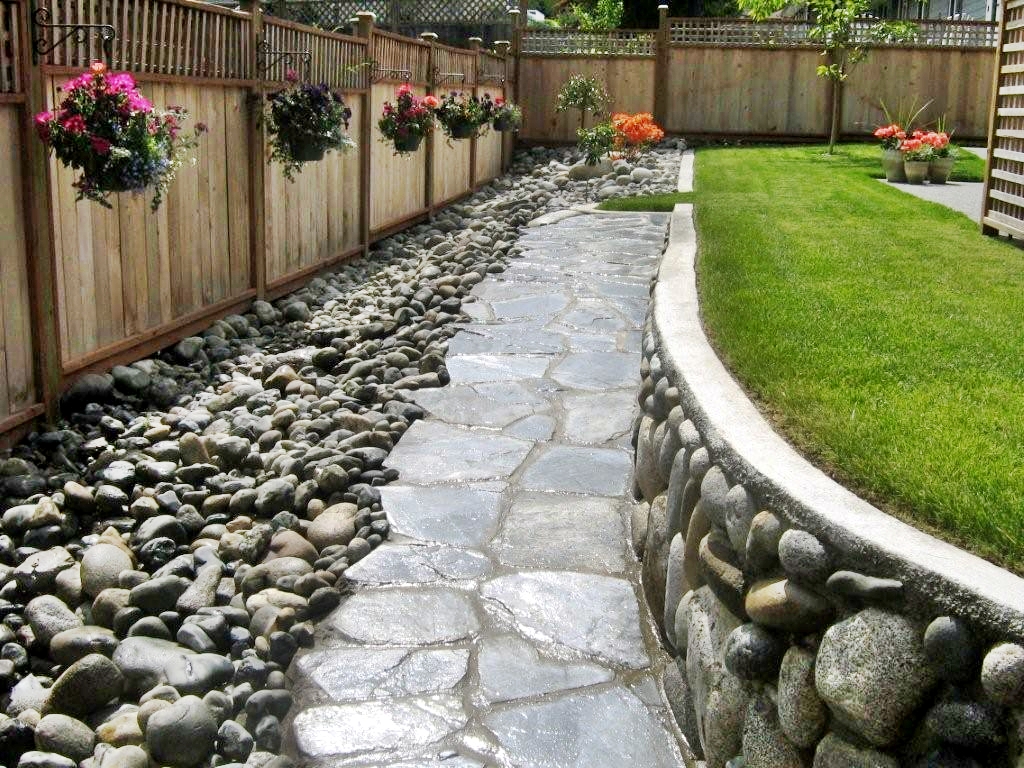 Backyard with beautiful river rocks