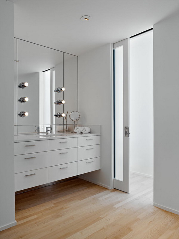 Bathroom featuring floor to ceiling pocket door