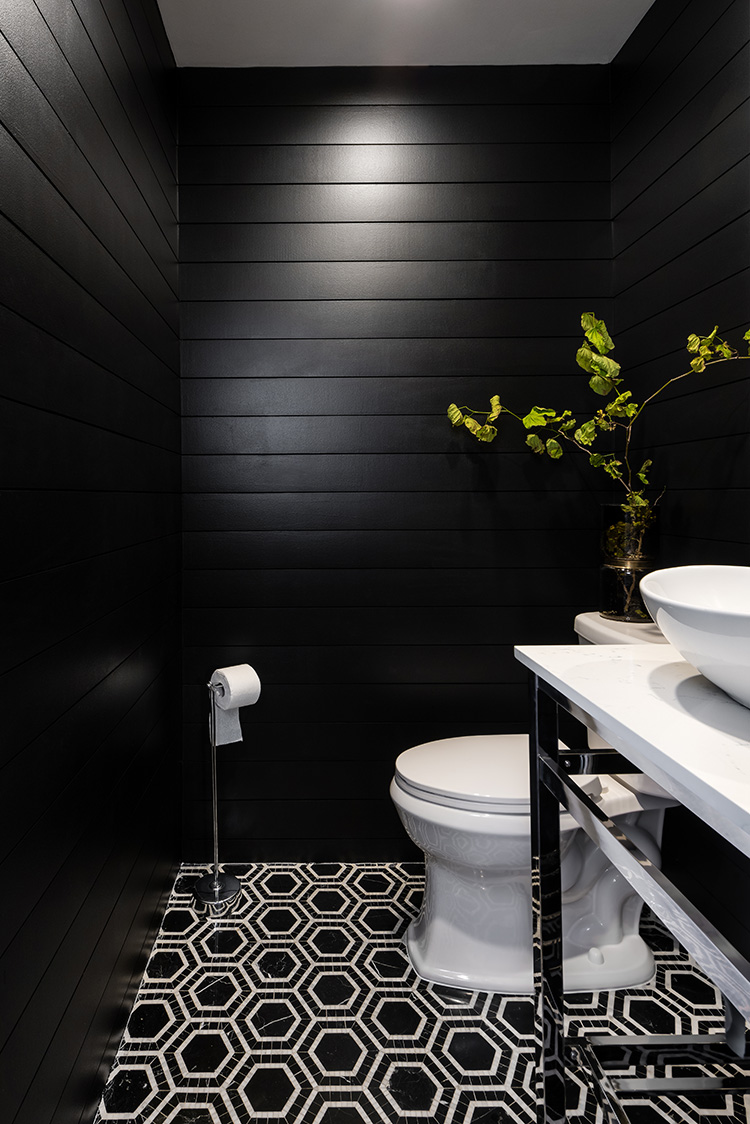 black and white powder room with printed tile