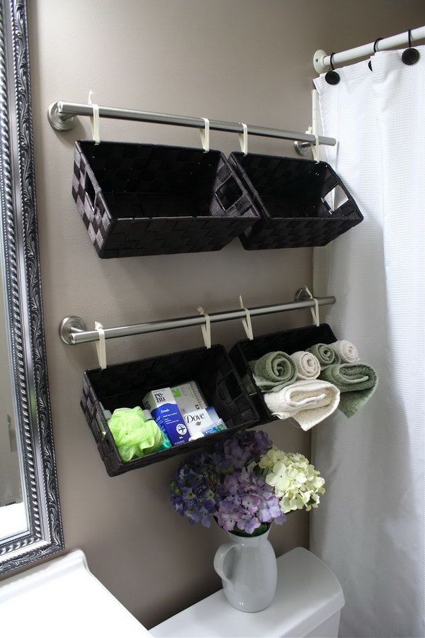 black-baskets-above-toilet