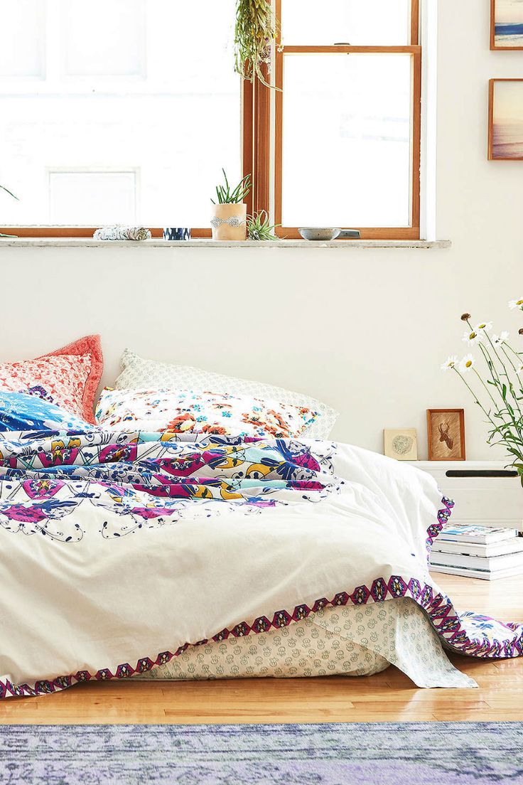 Bright white and purple boho bedroom