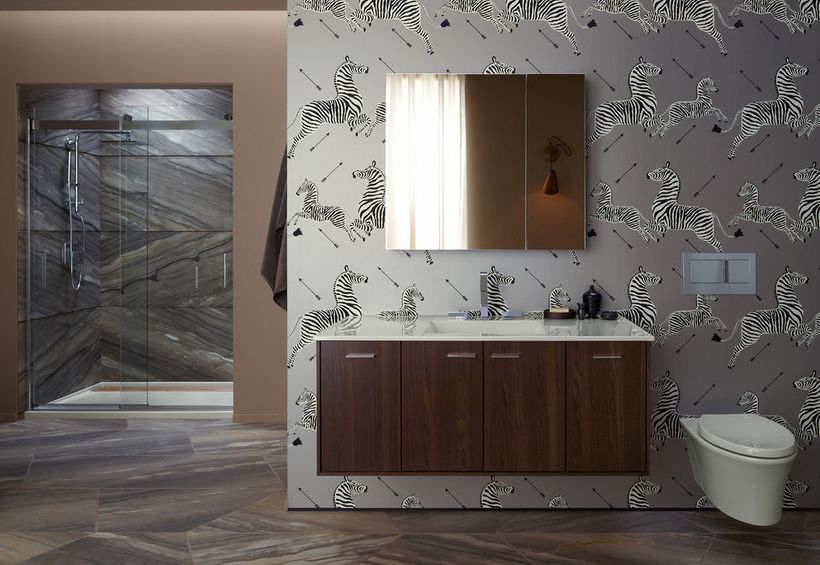 Brown bathroom furniture with wallpaper