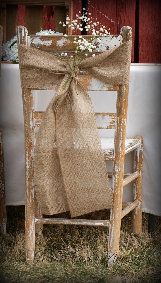 Cute burlap bows at the back of the chairs
