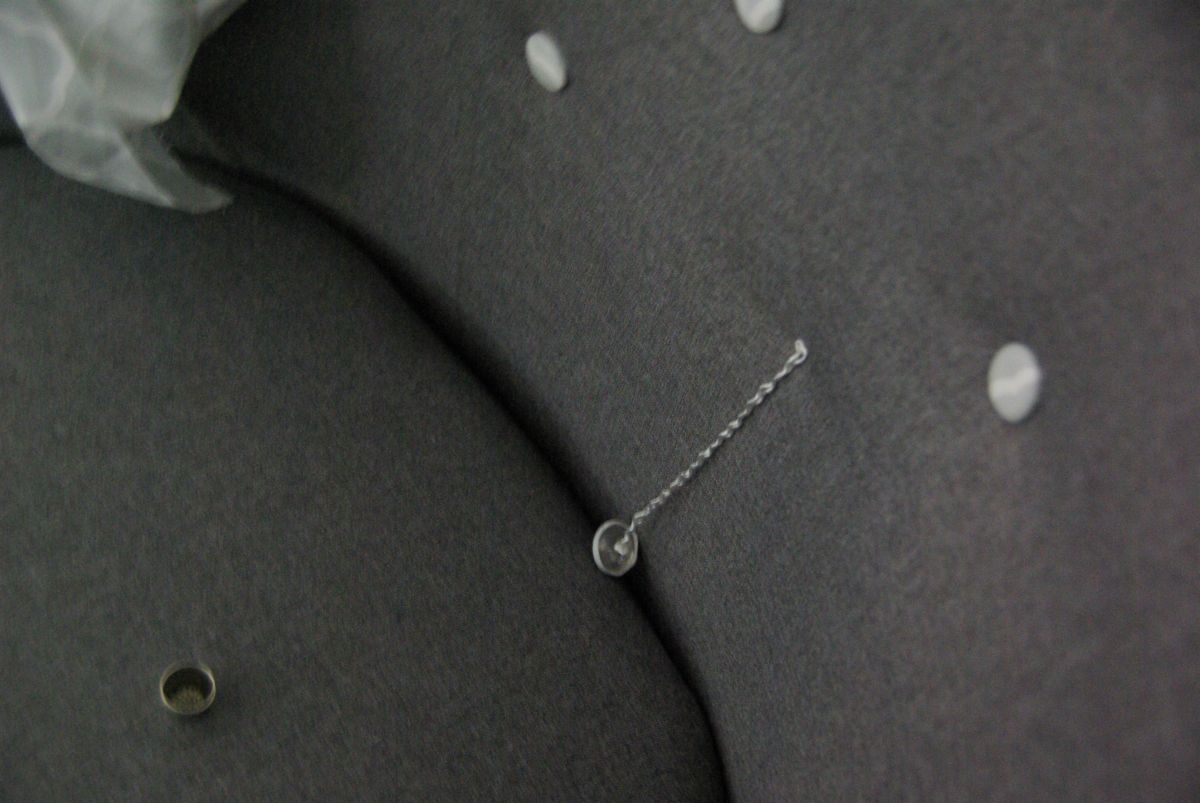 Chair reupholster adding the details 5