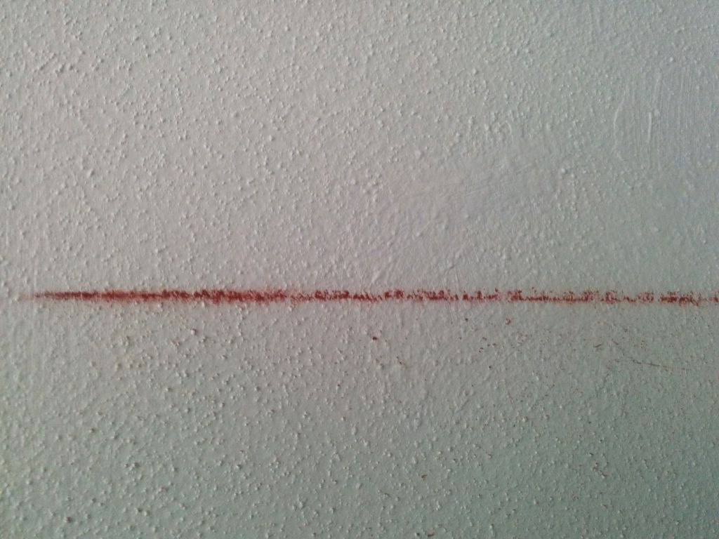 Chalk line mark on wall x on wall2