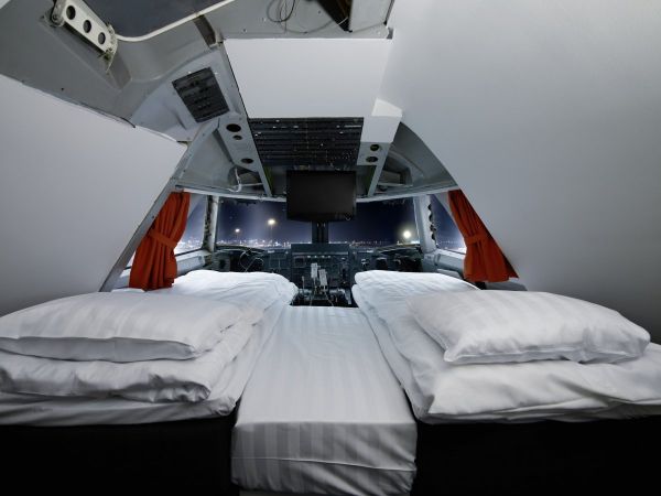 Check into the bedroom in the cockpit for a great view of the night sky