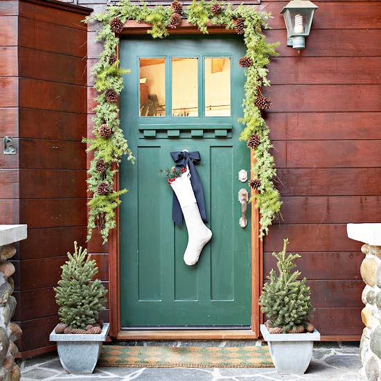 Christmas front door decoration stoking and garland