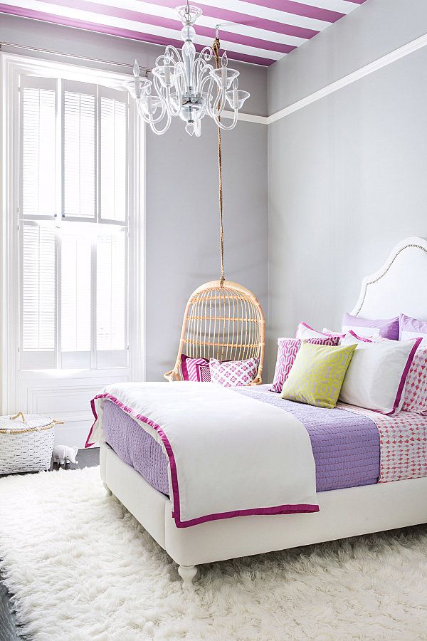 Clean teenage purple room hanging bed