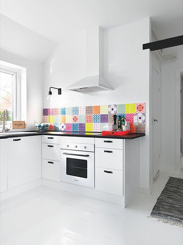 Colorful backsplash in a white kitchen