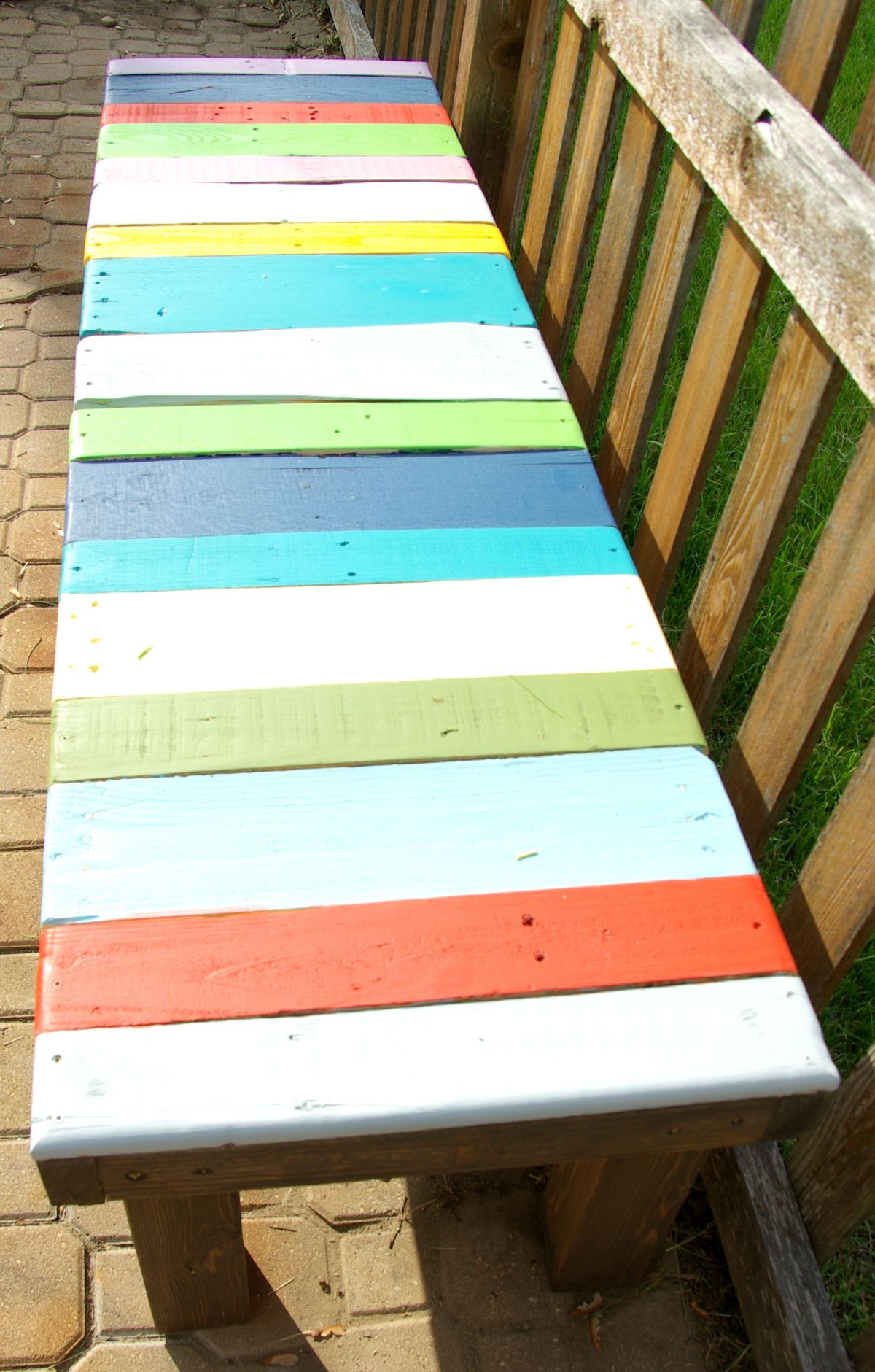 Colorful wood pallet bench retreat