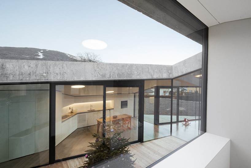 Concrete ceiling with glass walls