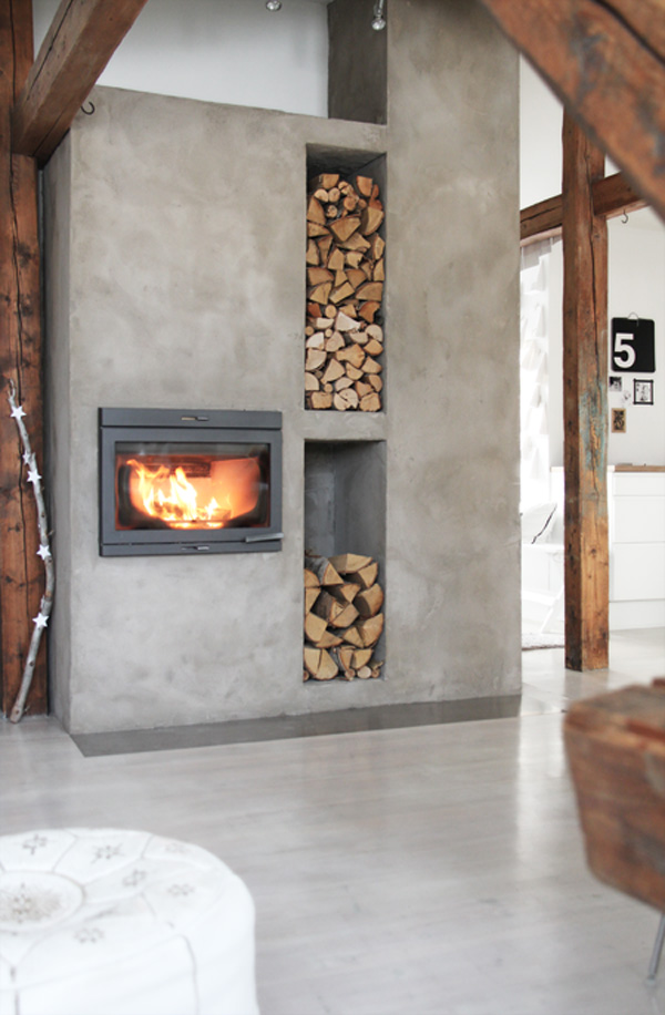 Concrete fireplace with firewood storage