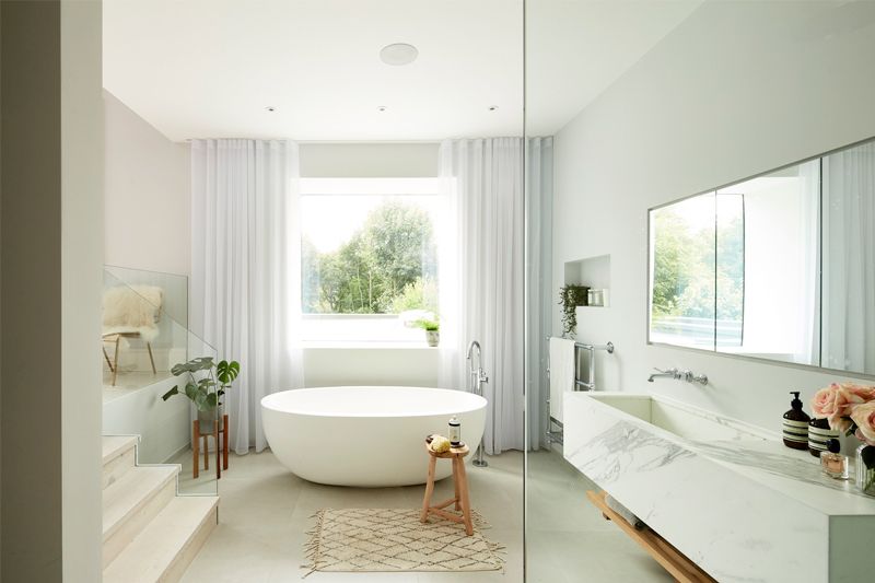 contemporary bathroom with smooth freestanding tub