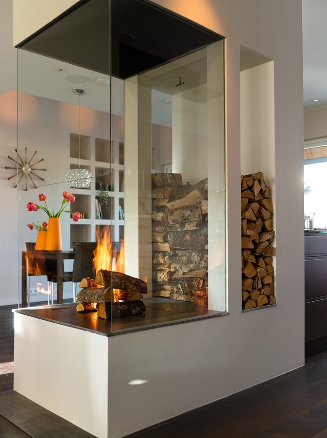 Contemporary fireplace design with storage for wood