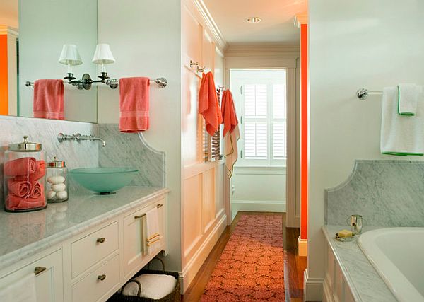 Coral accents for a mint bathroom
