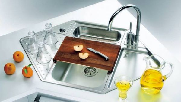 functional kitchen sink with dry rack and cutting board