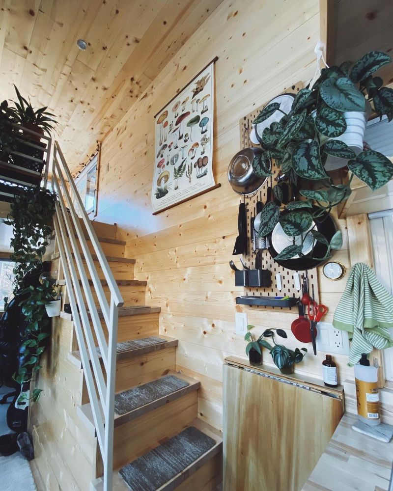 There's a small fold-down table neatly squeezed between the kitchen and the staircase 