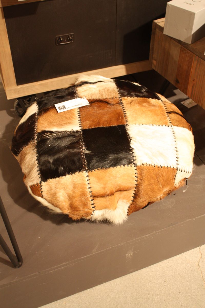 cowhide round ottoman design