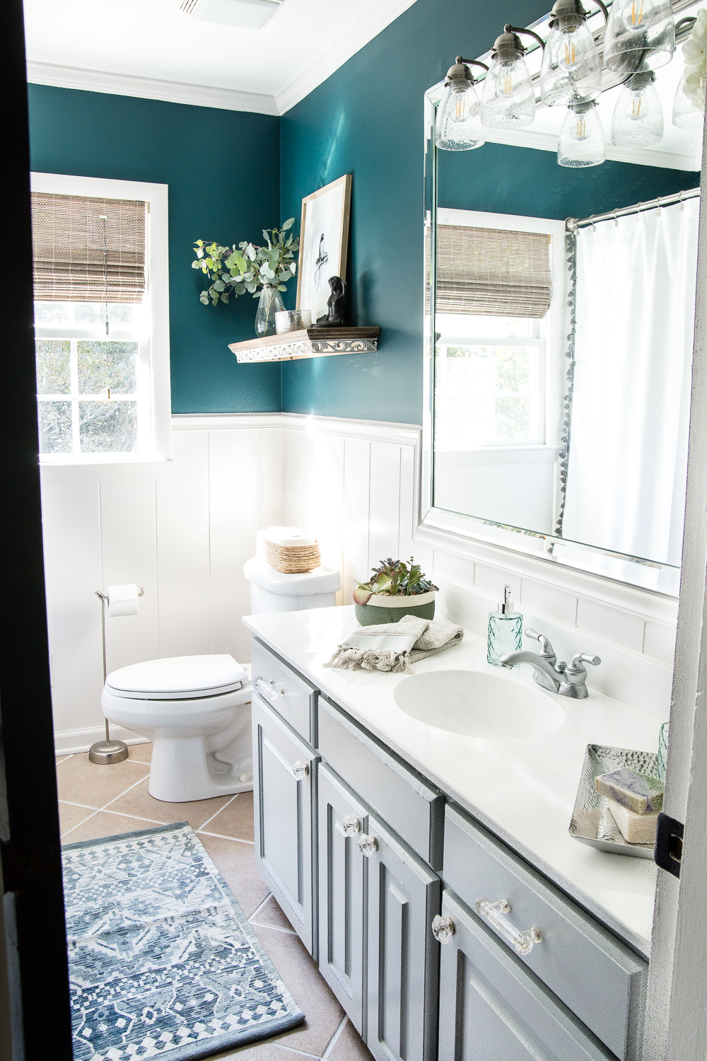 deep teal powder room