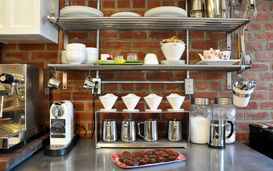 exposed-bricks-and-stainless-steel-shelves