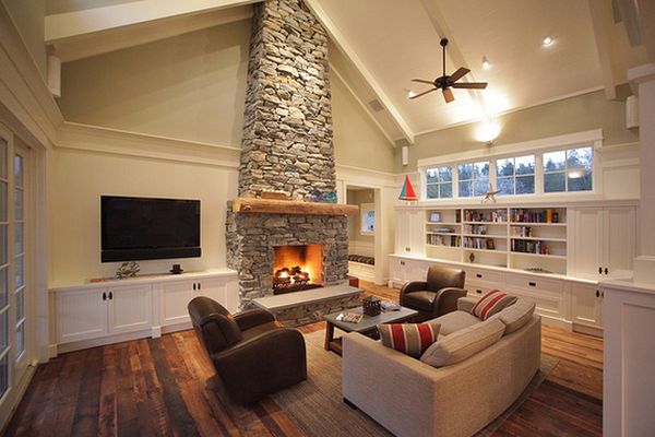 Floor to ceiling fireplace with floating tv