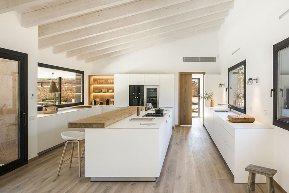 Plenty of wood keeps the modern kitchen from feeling too cold.