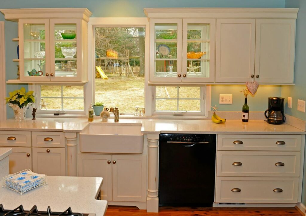 Glass cabinets in front of window 1024x722