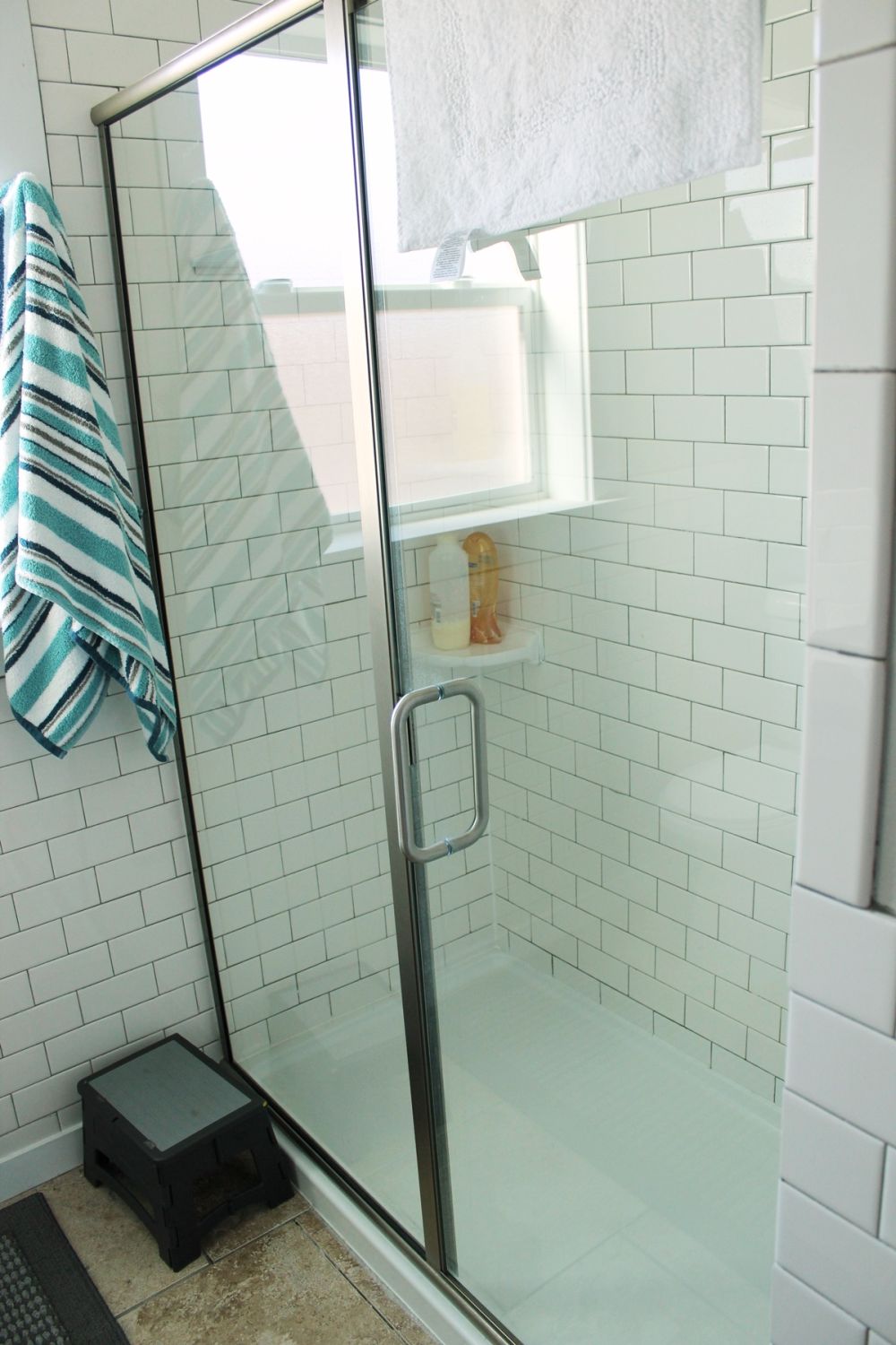 glass-doored walk-in shower