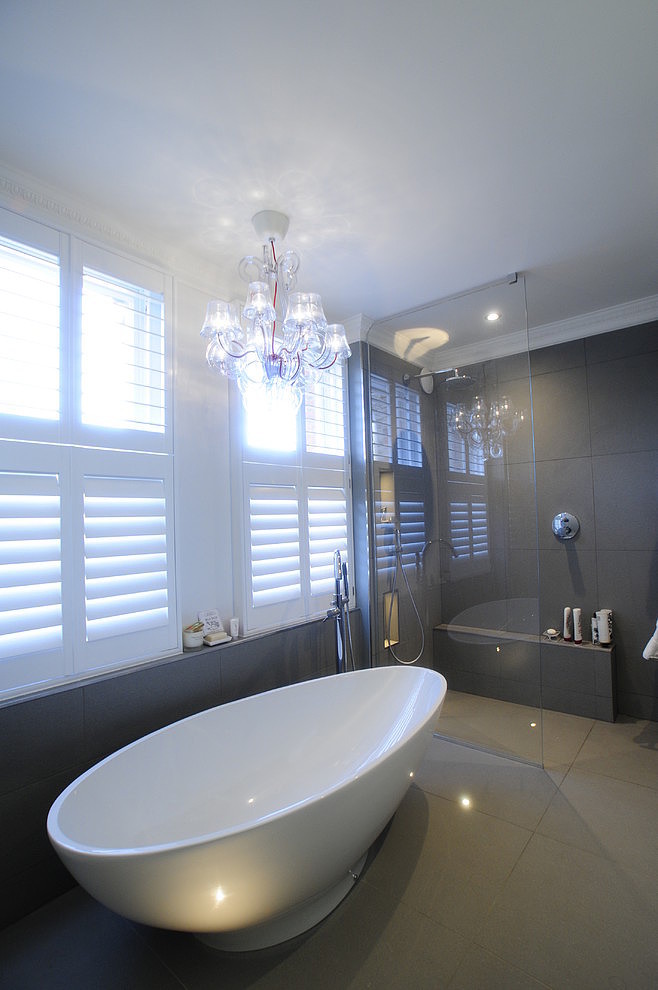 grey-bathroom-with-chandelier