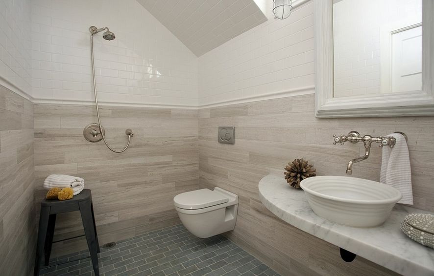 Grey marble bathroom with wall hung toilet