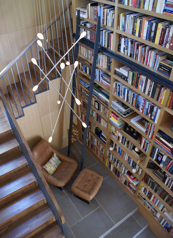 High ceilings batons chandelier home library