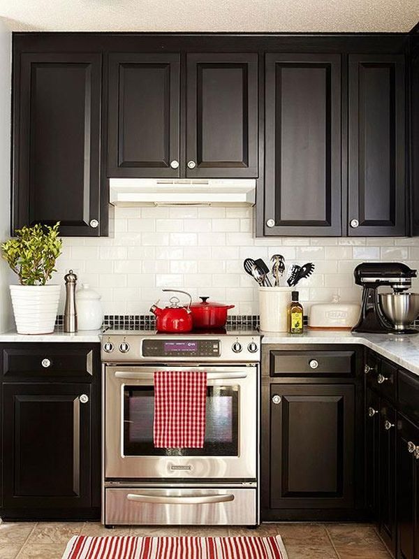 Hints of green in black kitchen
