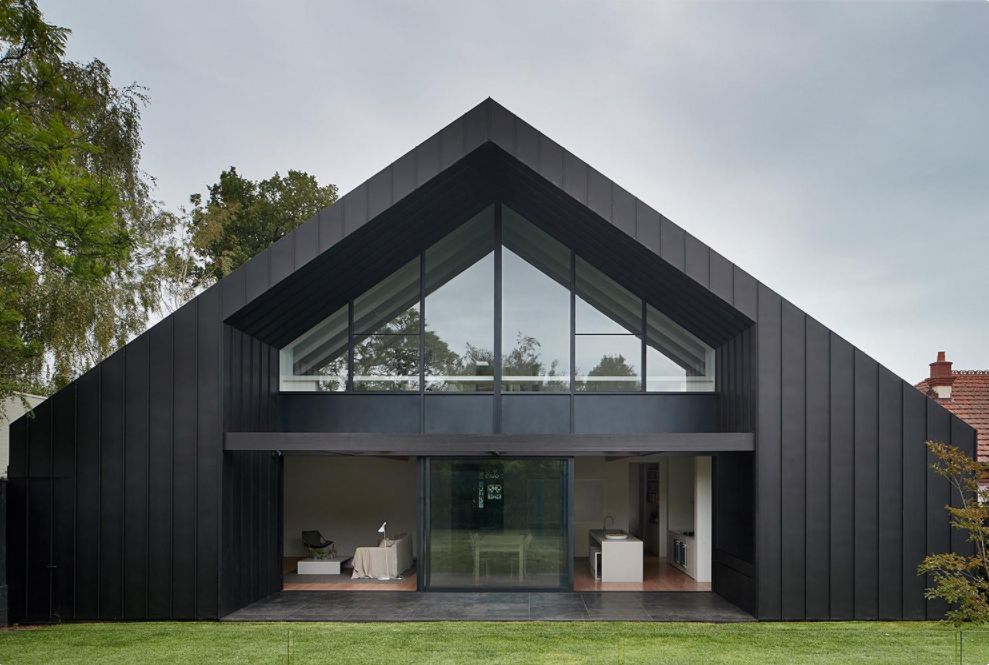 House with black metal siding exterior