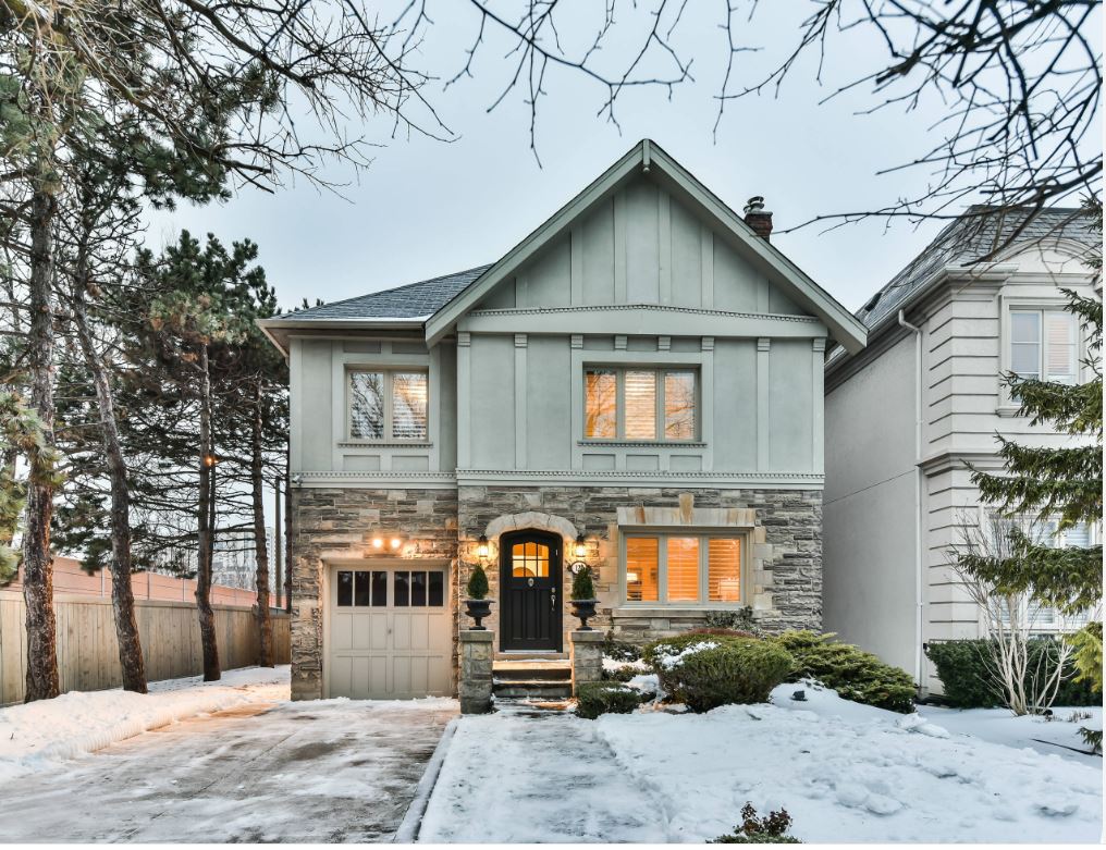 House with mixed siding in snow