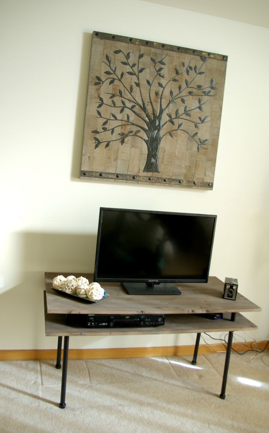 Industrial TV stand decor above