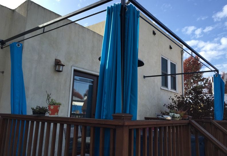 install-curtain-rods-patio-privacy