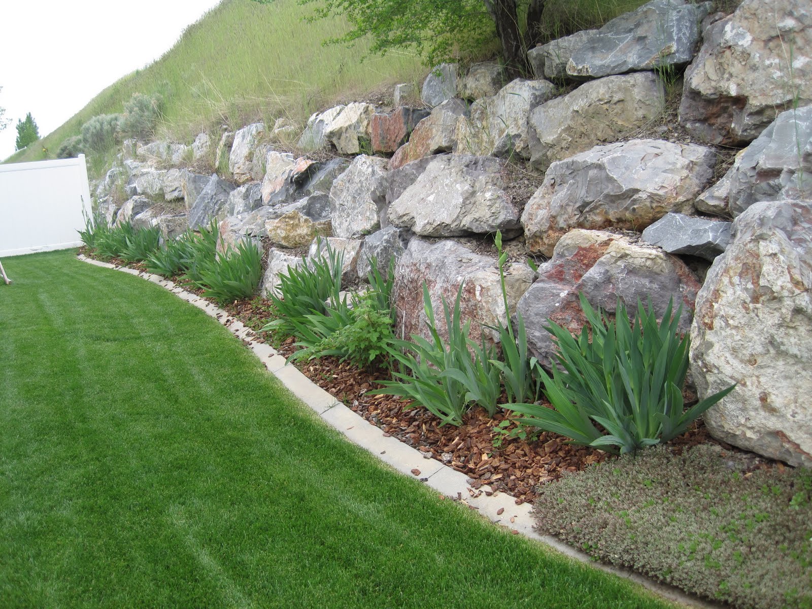 Large rock retaining wall