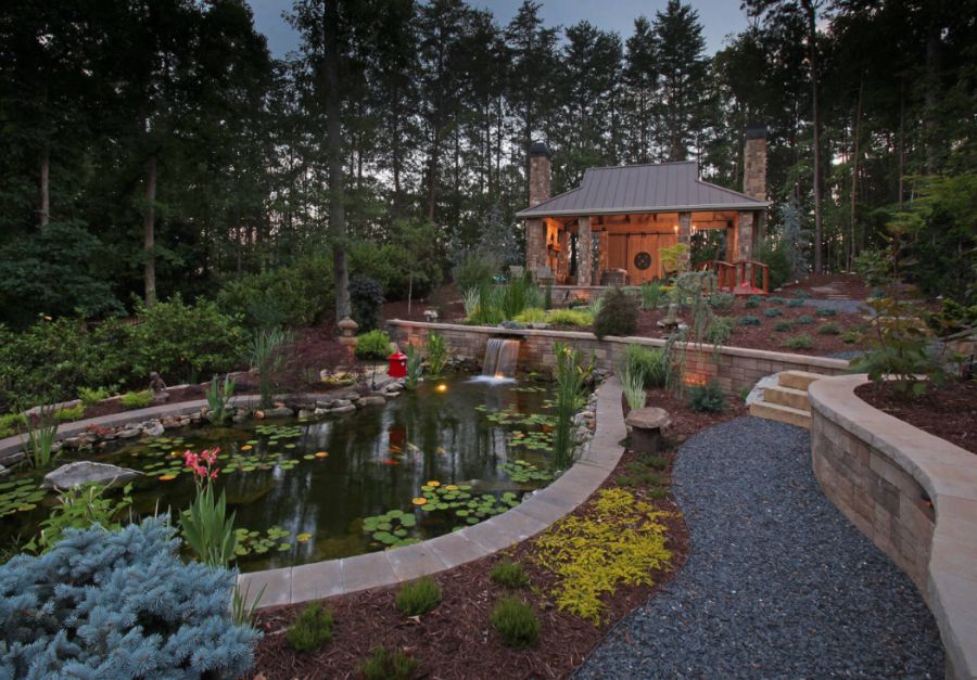 Large rustic backyard stone water fountain landscape in Atlanta