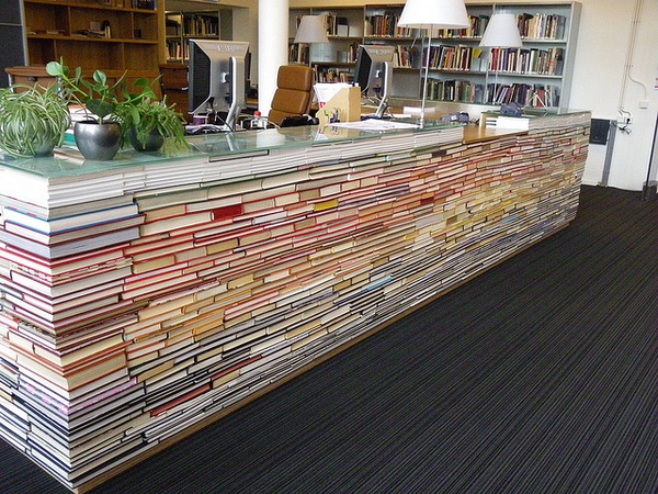 Library desk reception made of books