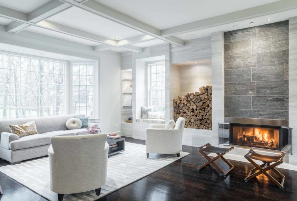 Living room with fireplace and wood stack 1024x693