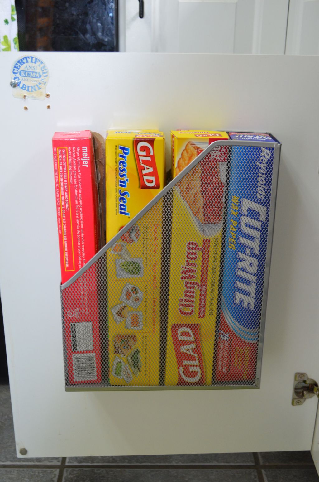 Magazine rack behind closet door