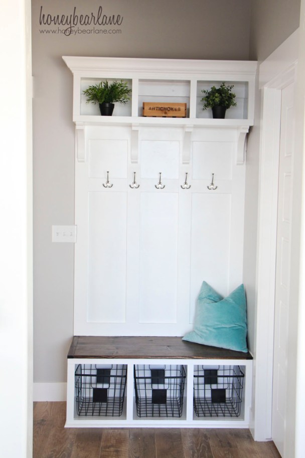 Wooden coat rack with bench and storage shelves
