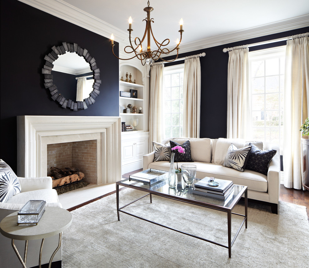 midnight living room interior decor with fireplace and chandelier