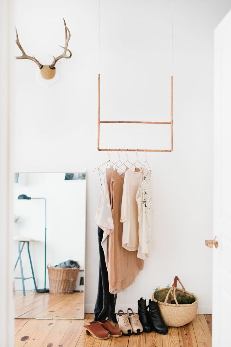 Minimalist copper ceiling clothes hanger