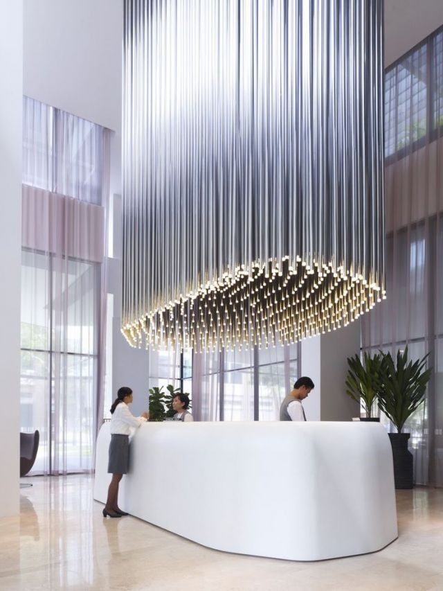 Minimalist reception desk eye cathing lighting system